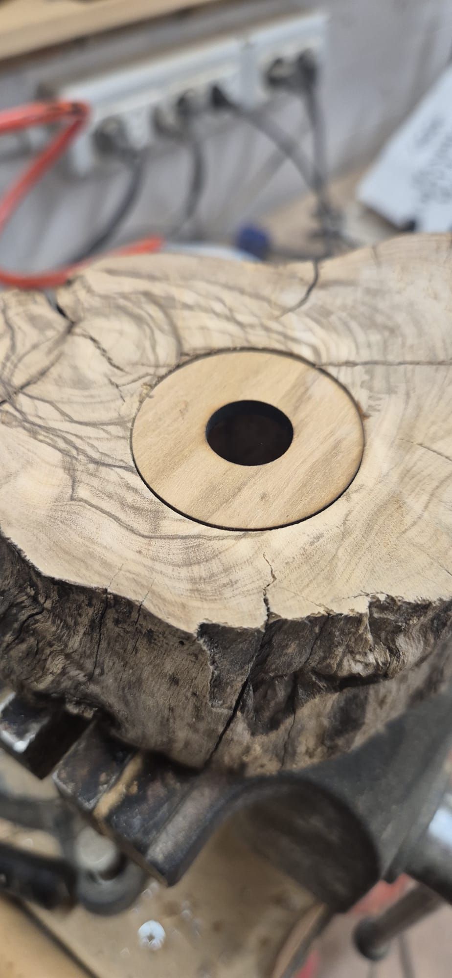Close-up of the sealed cavity insert on a finished olive wood diffuser