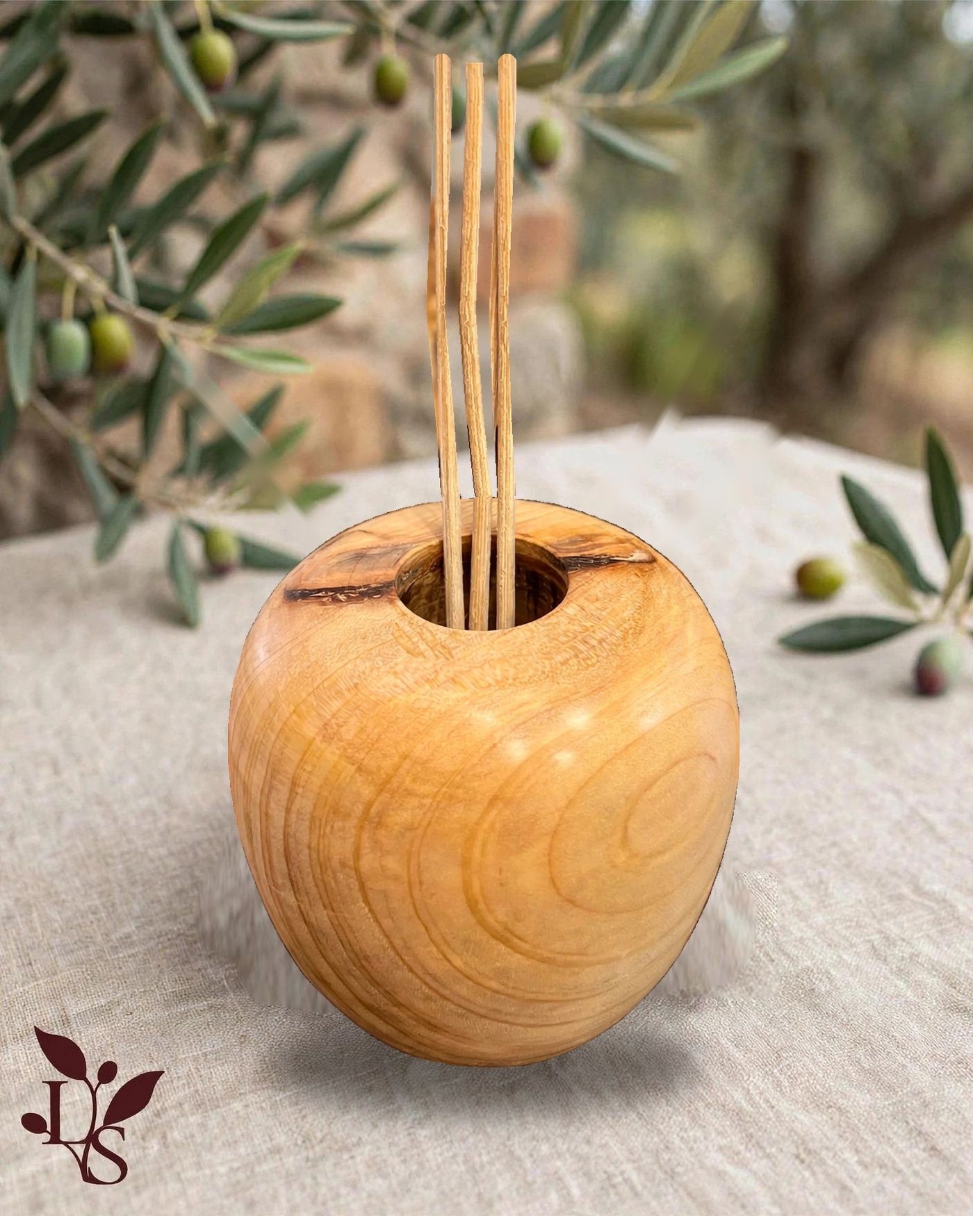 Smooth round olive wood diffuser, turned entirely on the lathe